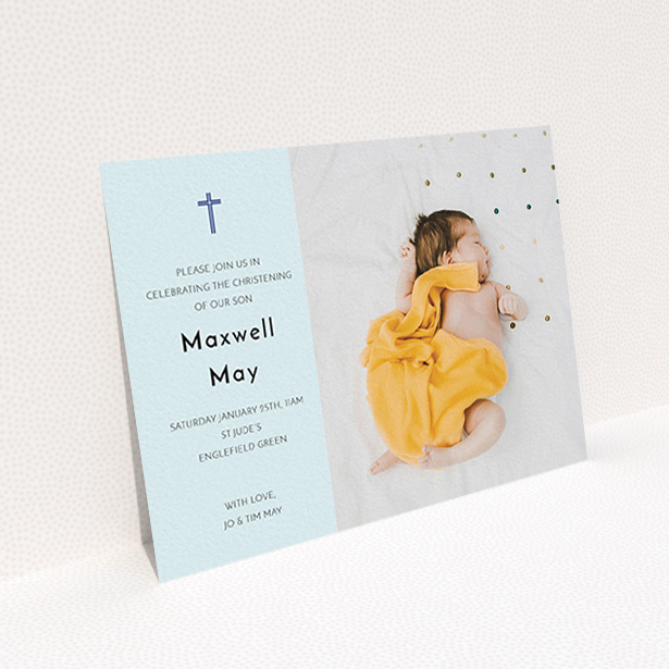 A christening invitation design called "Cross Photo". It is an A6 invite in a landscape orientation. It is a photographic christening invitation with room for 1 photo. "Cross Photo" is available as a flat invite, with mainly blue colouring.