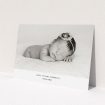 A christening invitation named "Duke of York Square". It is an A5 invite in a landscape orientation. It is a photographic christening invitation with room for 1 photo. "Duke of York Square" is available as a flat invite, with mainly white colouring.