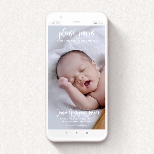A christening invitation for whatsapp design called "On the Photo". It is a smartphone screen sized invite in a portrait orientation. It is a photographic christening invitation for whatsapp with room for 2 photos. "On the Photo" is available as a flat invite, with mainly white colouring.