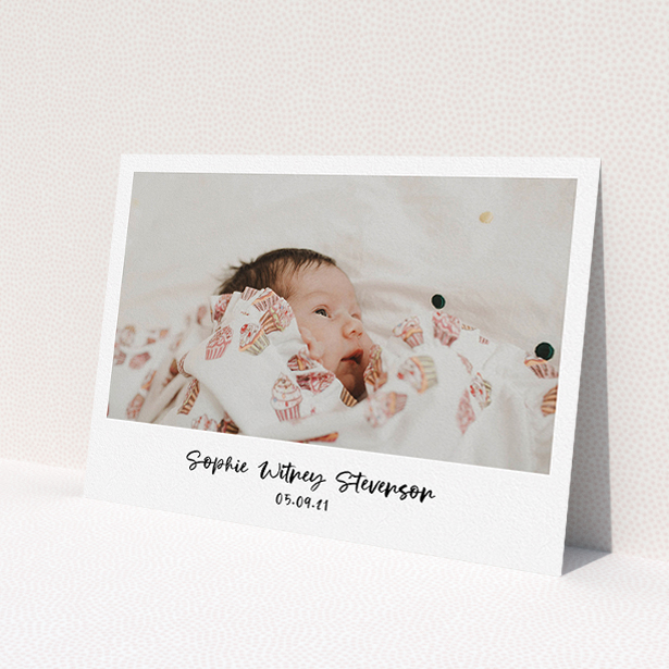 A christening invitation design named "Handwritten Photo". It is an A5 invite in a landscape orientation. It is a photographic christening invitation with room for 1 photo. "Handwritten Photo" is available as a flat invite, with mainly white colouring.