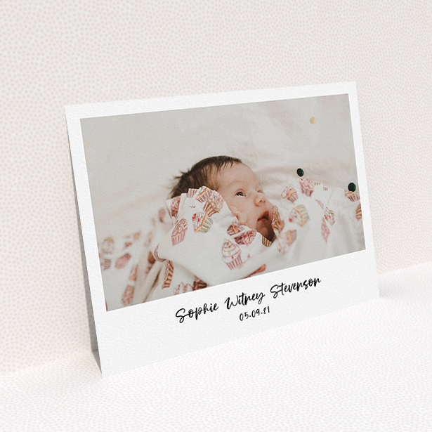 A christening invitation design named "Handwritten Photo". It is an A5 invite in a landscape orientation. It is a photographic christening invitation with room for 1 photo. "Handwritten Photo" is available as a flat invite, with mainly white colouring.
