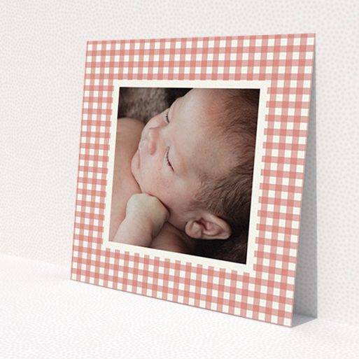 A christening invitation named 'Pink Plaid'. It is a square (148mm x 148mm) invite in a square orientation. It is a photographic christening invitation with room for 1 photo. 'Pink Plaid' is available as a flat invite, with tones of pink and white.