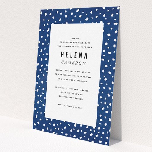 A christening invitation called 'White Polka dots'. It is an A5 invite in a portrait orientation. 'White Polka dots' is available as a flat invite, with tones of blue and white.