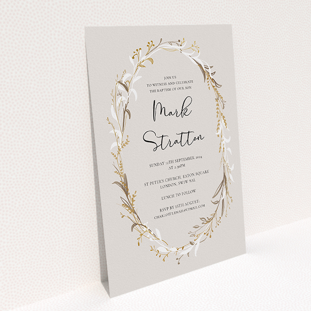 A christening invitation named "Winter Wreath". It is an A5 invite in a portrait orientation. "Winter Wreath" is available as a flat invite, with tones of dark cream and gold.