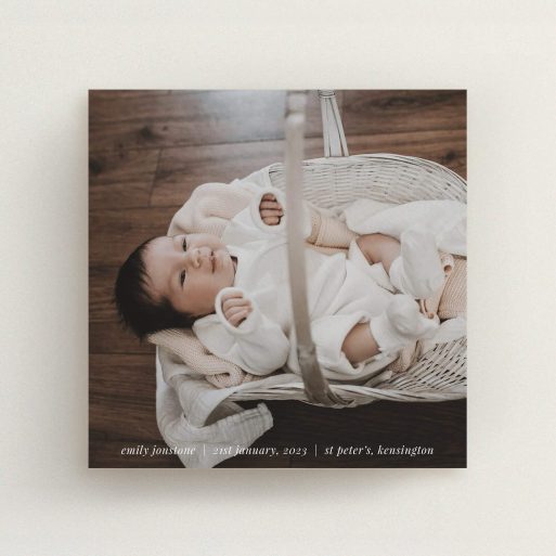 Christening Invite Design - "Classic Christening Photo" A christening invite design titled "Classic Christening Photo". It is a square (148mm x 148mm) invite in a square orientation. It is a photographic christening invite with room for 1 photo. "Classic Christening Photo" is available as a flat invite, with mainly white colouring.
