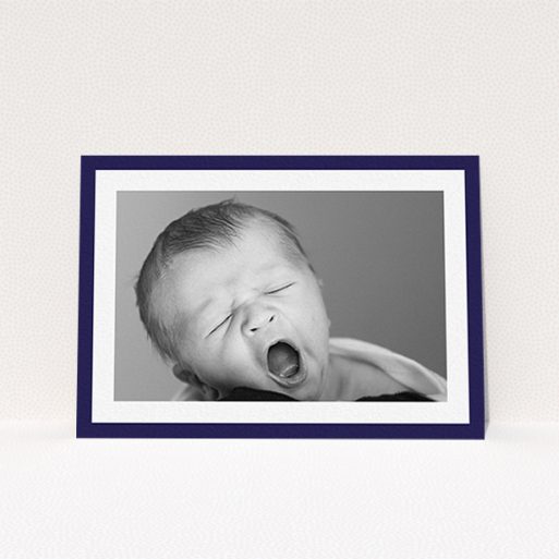A christening invite template titled "Classic Navy Photo Frame". It is an A6 invite in a landscape orientation. It is a photographic christening invite with room for 1 photo. "Classic Navy Photo Frame" is available as a flat invite, with tones of blue and white.