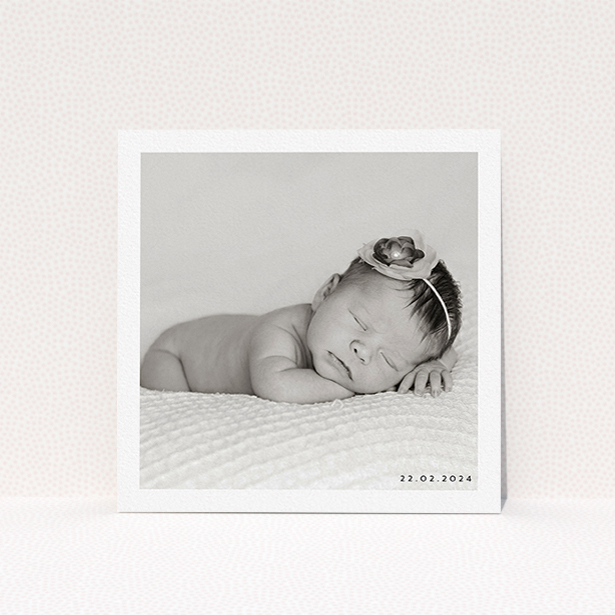 A christening invite design called "Classic Photo & Date Arrangement". It is a square (148mm x 148mm) invite in a square orientation. It is a photographic christening invite with room for 1 photo. "Classic Photo & Date Arrangement" is available as a flat invite, with mainly white colouring.