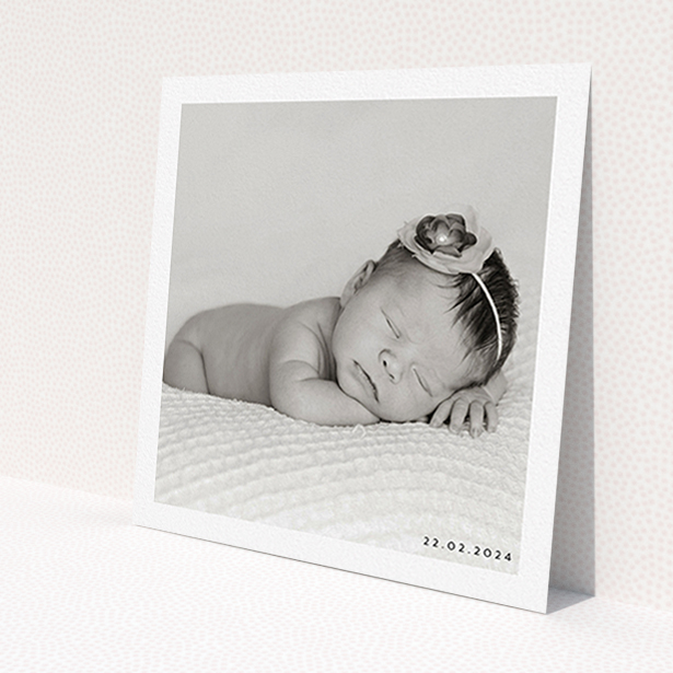A christening invite design called 'Classic Photo & Date Arrangement'. It is a square (148mm x 148mm) invite in a square orientation. It is a photographic christening invite with room for 1 photo. 'Classic Photo & Date Arrangement' is available as a flat invite, with mainly white colouring.