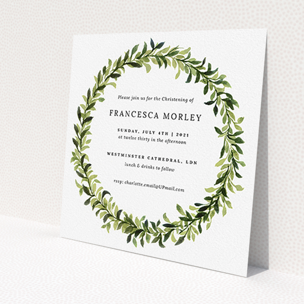 A christening invite named 'Classic Wreath'. It is a square (148mm x 148mm) invite in a square orientation. 'Classic Wreath' is available as a flat invite, with tones of light green and dark green.