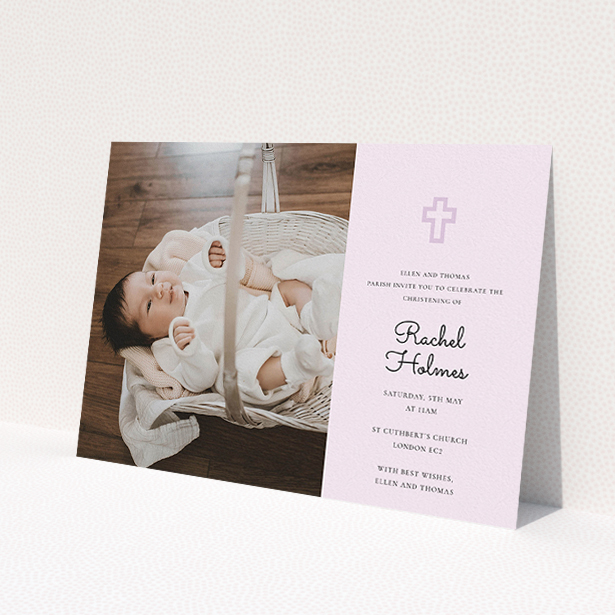 A christening invite design named 'Cross Photo'. It is an A5 invite in a landscape orientation. It is a photographic christening invite with room for 1 photo. 'Cross Photo' is available as a flat invite, with mainly purple/dark pink colouring.