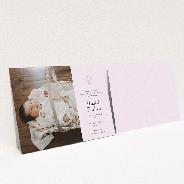 A christening invite design named "Cross Photo". It is an A5 invite in a landscape orientation. It is a photographic christening invite with room for 1 photo. "Cross Photo" is available as a flat invite, with mainly purple/dark pink colouring.