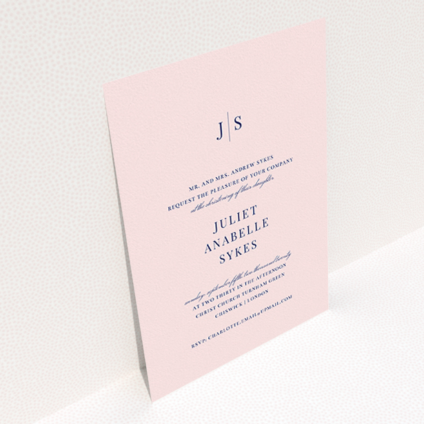 A christening invite design called "Monogrammed Pink Tradition". It is an A5 invite in a portrait orientation. "Monogrammed Pink Tradition" is available as a flat invite, with tones of blue and pink.