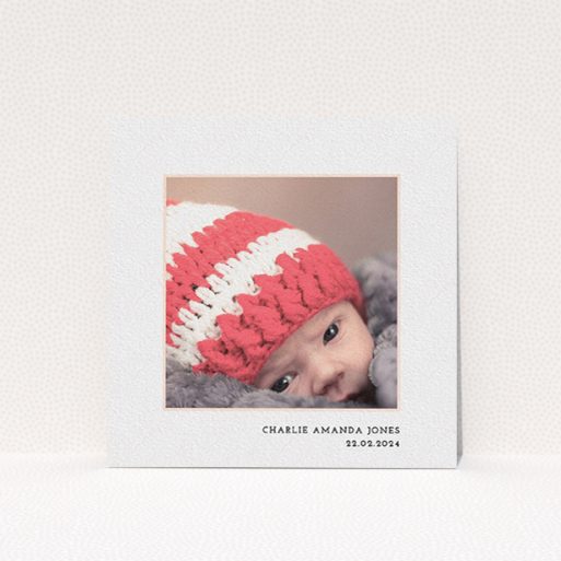 A christening invite design titled "Photo Centre". It is a square (148mm x 148mm) invite in a square orientation. It is a photographic christening invite with room for 1 photo. "Photo Centre" is available as a flat invite, with mainly white colouring.