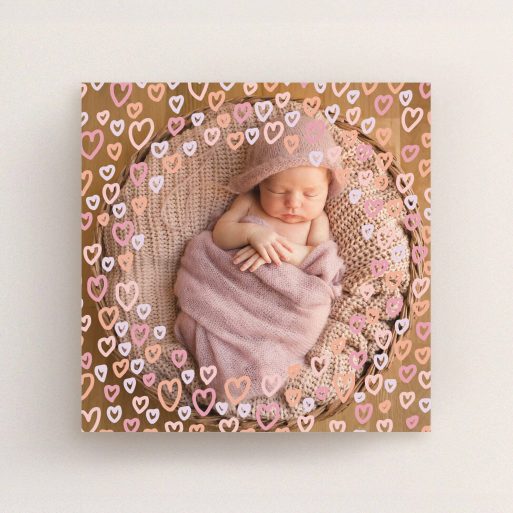 Christening Invite Design - "Pink Hearts" A christening invite design called "Pink Hearts". It is a square (148mm x 148mm) invite in a square orientation. It is a photographic christening invite with room for 1 photo. "Pink Hearts" is available as a flat invite, with mainly pink colouring.