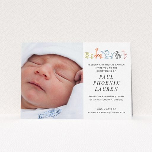 A christening invite design titled "Playground Safari". It is an A5 invite in a landscape orientation. It is a photographic christening invite with room for 1 photo. "Playground Safari" is available as a flat invite, with tones of white and orange.