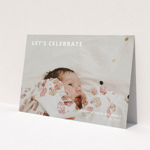 A christening invite design titled 'Sans Serif'. It is an A5 invite in a landscape orientation. It is a photographic christening invite with room for 1 photo. 'Sans Serif' is available as a flat invite, with mainly white colouring.