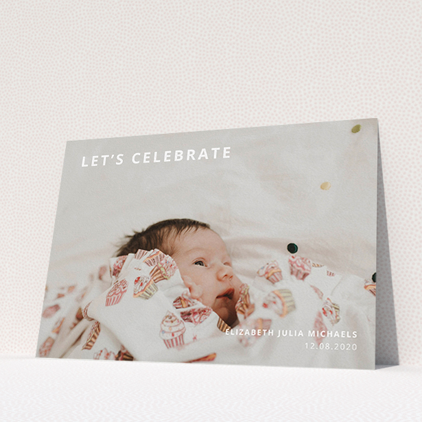 A christening invite design titled "Sans Serif". It is an A5 invite in a landscape orientation. It is a photographic christening invite with room for 1 photo. "Sans Serif" is available as a flat invite, with mainly white colouring.