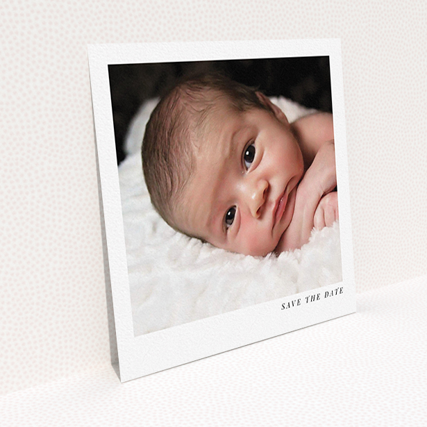 A christening invite design titled "Welcome". It is a square (148mm x 148mm) invite in a square orientation. It is a photographic christening invite with room for 1 photo. "Welcome" is available as a flat invite, with mainly white colouring.