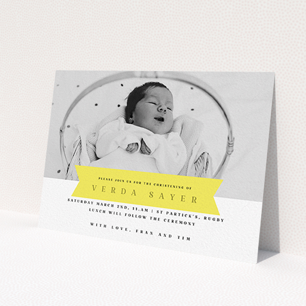 A christening invite design titled 'Yellow Banner'. It is an A6 invite in a landscape orientation. It is a photographic christening invite with room for 1 photo. 'Yellow Banner' is available as a flat invite, with tones of yellow and white.
