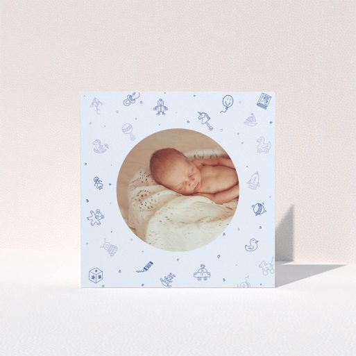Christening Thank You Card Design - "All the toys" A christening thank you card named "All the toys". It is a square (148mm x 148mm) card in a square orientation. It is a photographic christening thank you card with room for 1 photo. "All the toys" is available as a folded card, with mainly blue colouring.