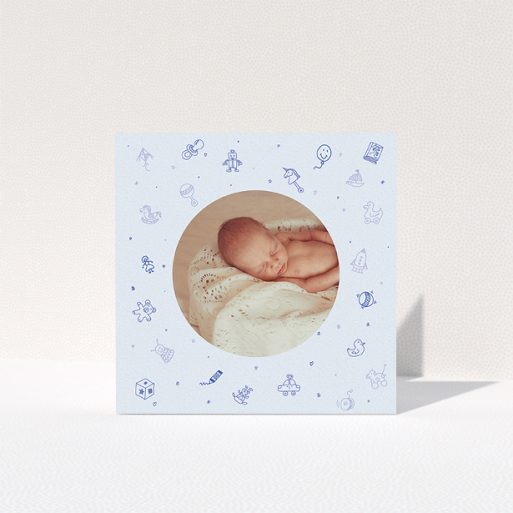 A christening thank you card named "All the toys". It is a square (148mm x 148mm) card in a square orientation. It is a photographic christening thank you card with room for 1 photo. "All the toys" is available as a folded card, with mainly blue colouring.