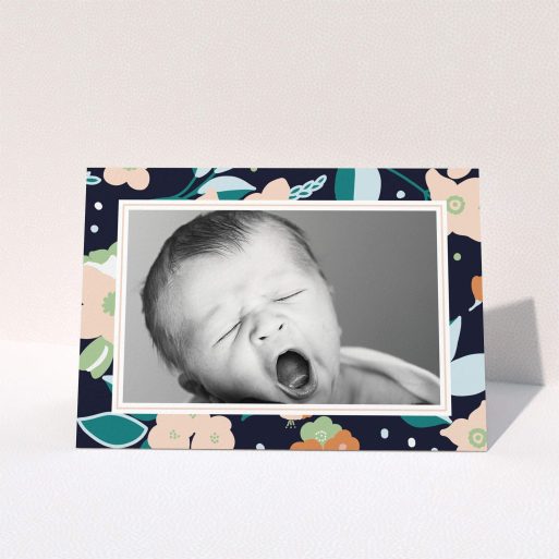 A christening thank you card design called "Bedtime Garden". It is an A6 card in a landscape orientation. It is a photographic christening thank you card with room for 1 photo. "Bedtime Garden" is available as a folded card, with tones of navy blue, pink and orange.