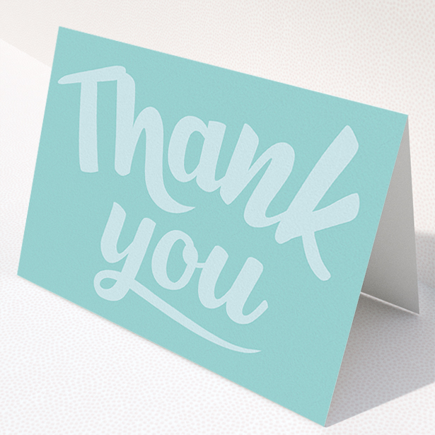 A christening thank you card named "Big Blue Typography". It is an A5 card in a landscape orientation. "Big Blue Typography" is available as a folded card, with mainly blue colouring.