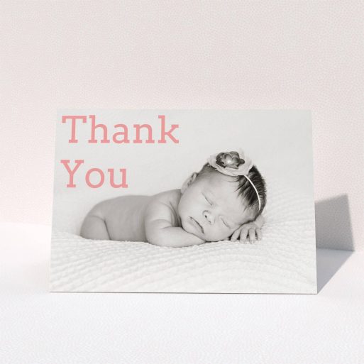 Christening Thank You Card Design - "Big Thanks" A christening thank you card design called "Big Thanks". It is an A5 card in a landscape orientation. It is a photographic christening thank you card with room for 1 photo. "Big Thanks" is available as a folded card, with mainly light pink colouring.