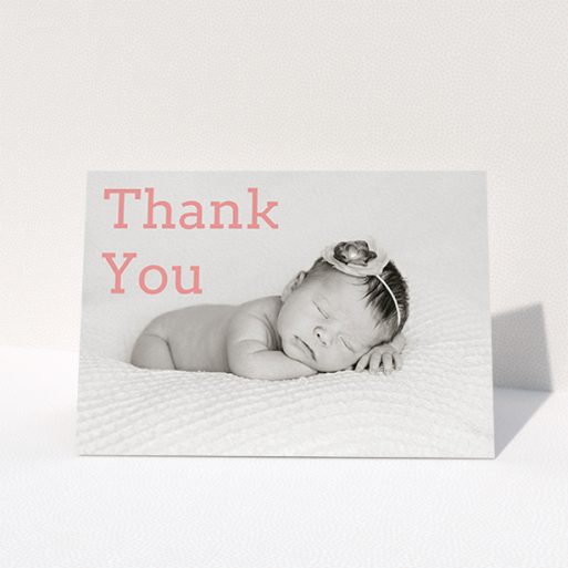 A christening thank you card design titled "Big Thanks". It is an A6 card in a landscape orientation. It is a photographic christening thank you card with room for 1 photo. "Big Thanks" is available as a folded card, with mainly light pink colouring.