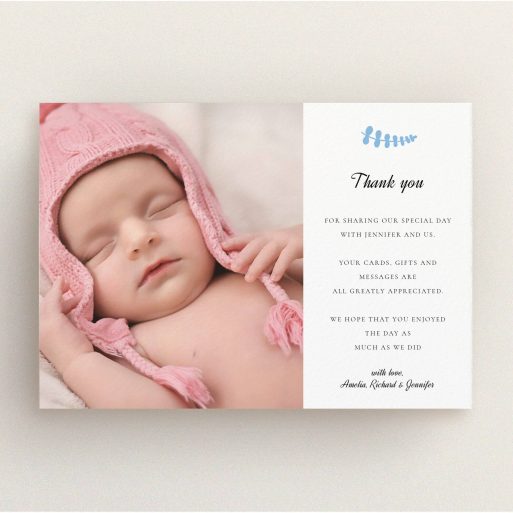 A christening thank you card design named "Blue Fern". It is an A5 card in a landscape orientation. It is a photographic christening thank you card with room for 1 photo. "Blue Fern" is available as a flat card, with tones of white and blue.