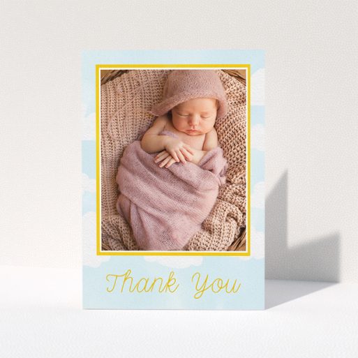 A christening thank you card design named "Blue Skies". It is an A5 card in a portrait orientation. It is a photographic christening thank you card with room for 1 photo. "Blue Skies" is available as a folded card, with tones of blue, yellow and white.