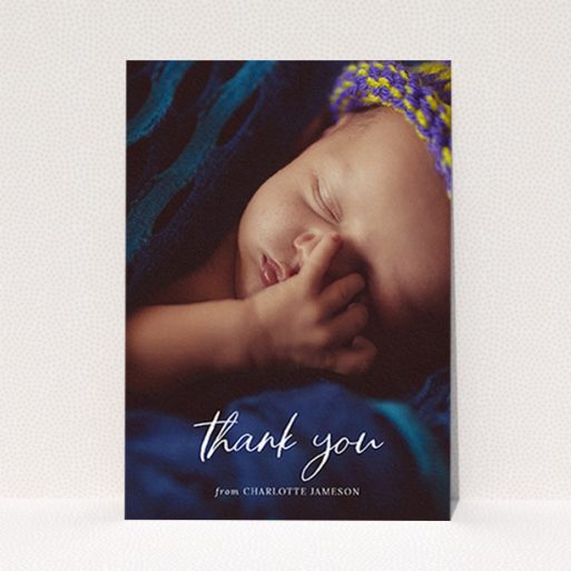 A christening thank you card template titled "Calligraphy Thanks". It is an A6 card in a portrait orientation. It is a photographic christening thank you card with room for 1 photo. "Calligraphy Thanks" is available as a flat card, with mainly white colouring.