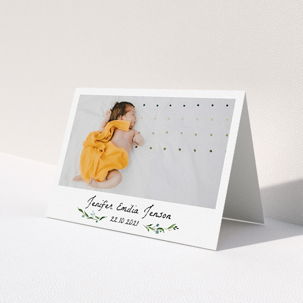 A christening thank you card design named "Classic Floral". It is an A5 card in a landscape orientation. It is a photographic christening thank you card with room for 1 photo. "Classic Floral" is available as a folded card, with mainly green colouring.