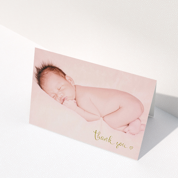 A christening thank you card called "Gold Thanks". It is an A5 card in a landscape orientation. It is a photographic christening thank you card with room for 1 photo. "Gold Thanks" is available as a folded card, with mainly white colouring.