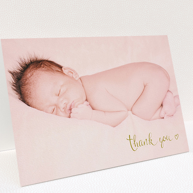 A christening thank you card called "Gold Thanks". It is an A5 card in a landscape orientation. It is a photographic christening thank you card with room for 1 photo. "Gold Thanks" is available as a folded card, with mainly white colouring.