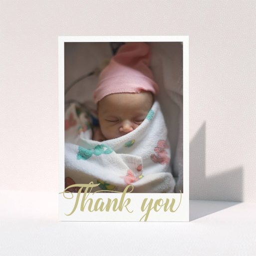 Christening Thank You Card Design - "Golden Thank You" A christening thank you card design titled "Golden Thank You". It is an A5 card in a portrait orientation. It is a photographic christening thank you card with room for 1 photo. "Golden Thank You" is available as a folded card, with tones of white and gold.