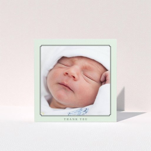 A christening thank you card design titled "Mint Deco". It is a square (148mm x 148mm) card in a square orientation. It is a photographic christening thank you card with room for 1 photo. "Mint Deco" is available as a folded card, with tones of green and white.