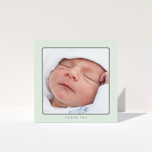 A christening thank you card design titled "Mint Deco". It is a square (148mm x 148mm) card in a square orientation. It is a photographic christening thank you card with room for 1 photo. "Mint Deco" is available as a folded card, with tones of green and white.
