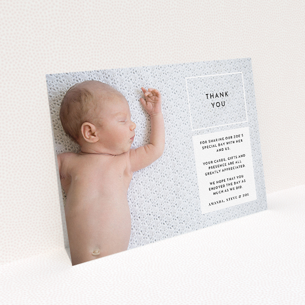 A christening thank you card called "Modern Side Frame". It is an A5 card in a landscape orientation. It is a photographic christening thank you card with room for 1 photo. "Modern Side Frame" is available as a flat card, with mainly black colouring.