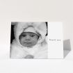 A christening thank you card design named "Most of the Page Frame". It is an A5 card in a landscape orientation. It is a photographic christening thank you card with room for 1 photo. "Most of the Page Frame" is available as a folded card, with mainly white colouring.