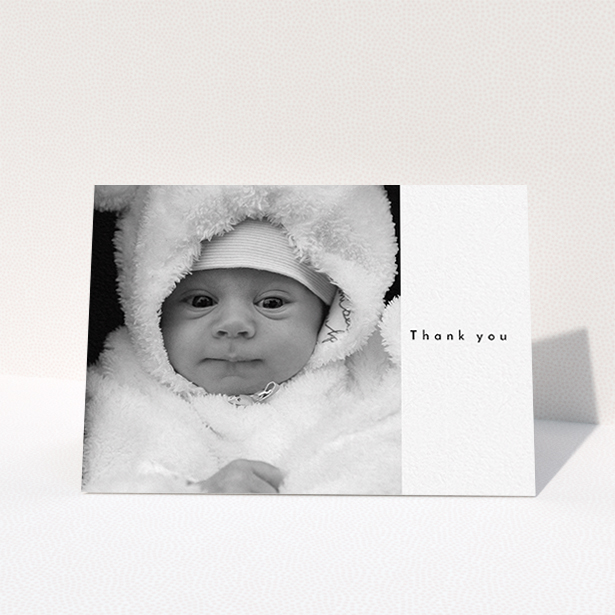 A christening thank you card design called "Most of the Page Frame". It is an A6 card in a landscape orientation. It is a photographic christening thank you card with room for 1 photo. "Most of the Page Frame" is available as a folded card, with mainly white colouring.
