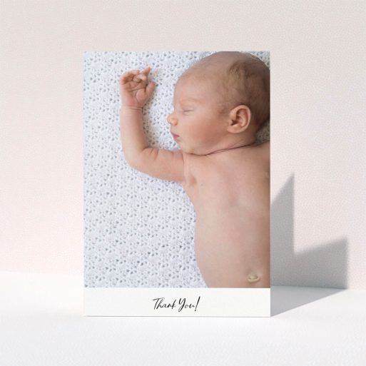 A christening thank you card design titled "Mr & Mrs Footer". It is an A5 card in a portrait orientation. It is a photographic christening thank you card with room for 1 photo. "Mr & Mrs Footer" is available as a folded card, with mainly white colouring.