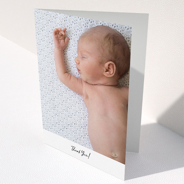 A christening thank you card design titled "Mr & Mrs Footer". It is an A5 card in a portrait orientation. It is a photographic christening thank you card with room for 1 photo. "Mr & Mrs Footer" is available as a folded card, with mainly white colouring.
