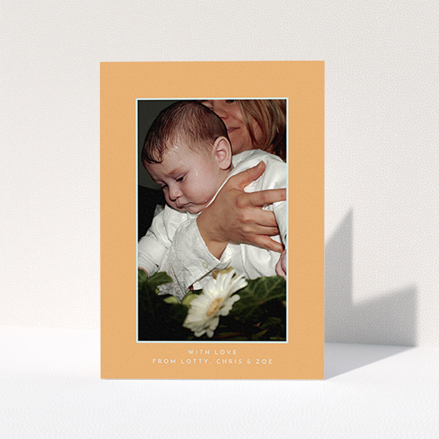 A christening thank you card design named "Orange and Mint". It is an A6 card in a portrait orientation. It is a photographic christening thank you card with room for 1 photo. "Orange and Mint" is available as a folded card, with tones of orange and blue.