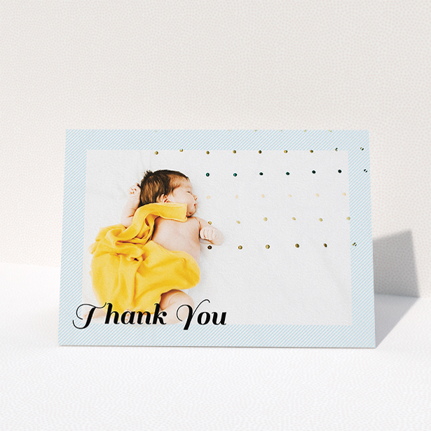 A christening thank you card design titled "Pastel Diagonals". It is an A5 card in a landscape orientation. It is a photographic christening thank you card with room for 1 photo. "Pastel Diagonals" is available as a folded card, with mainly blue colouring.