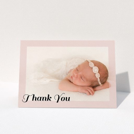 A christening thank you card named "Pastel Diagonals". It is an A5 card in a landscape orientation. It is a photographic christening thank you card with room for 1 photo. "Pastel Diagonals" is available as a folded card, with mainly pink colouring.