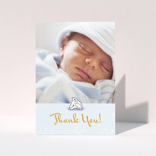 A christening thank you card design named "Polar Picture". It is an A6 card in a portrait orientation. It is a photographic christening thank you card with room for 1 photo. "Polar Picture" is available as a folded card, with tones of blue and white.