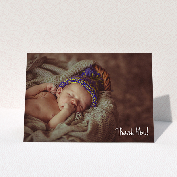 A christening thank you card named "Rough but Simple Photo". It is an A6 card in a landscape orientation. It is a photographic christening thank you card with room for 1 photo. "Rough but Simple Photo" is available as a folded card, with mainly white colouring.