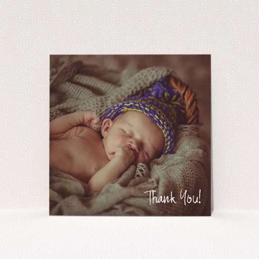 A christening thank you card design named "Rough but Simple Photo". It is a square (148mm x 148mm) card in a square orientation. It is a photographic christening thank you card with room for 1 photo. "Rough but Simple Photo" is available as a flat card, with mainly white colouring.
