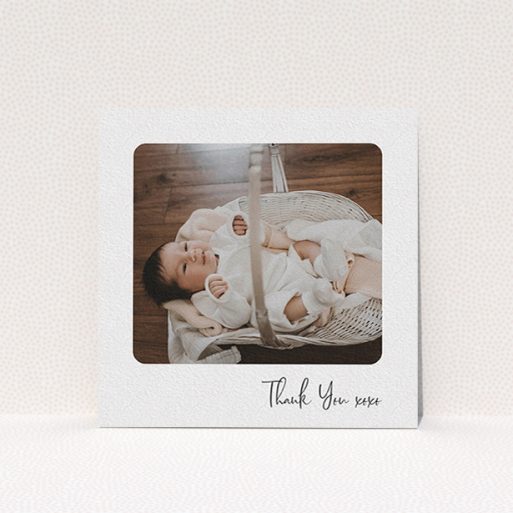 A christening thank you card named "Rounded Thanks". It is a square (148mm x 148mm) card in a square orientation. It is a photographic christening thank you card with room for 1 photo. "Rounded Thanks" is available as a flat card, with mainly white colouring.